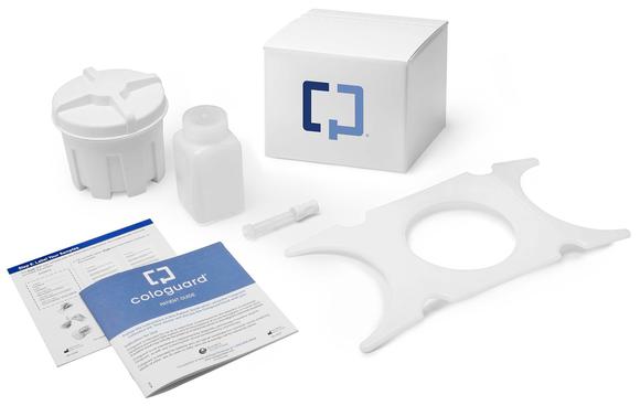 A Cologuard testing kit on top of a white surface