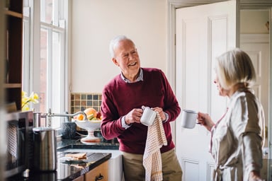 senior couple in a kitchen_GettyImages-682635436