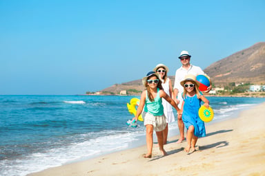 family at the beach_GettyImages-669740742