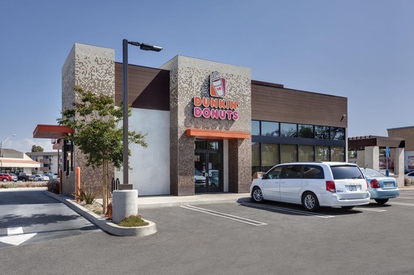 The exterior of a Dunkin' Donuts.