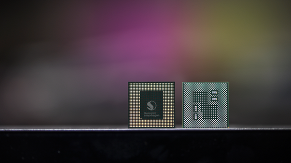 Two Qualcomm processors side-by-side.