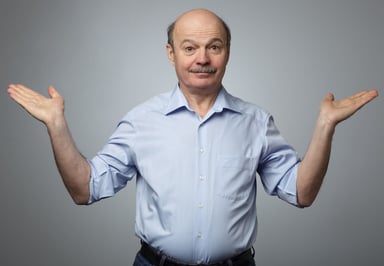 man shrugging confused surprised uncertain