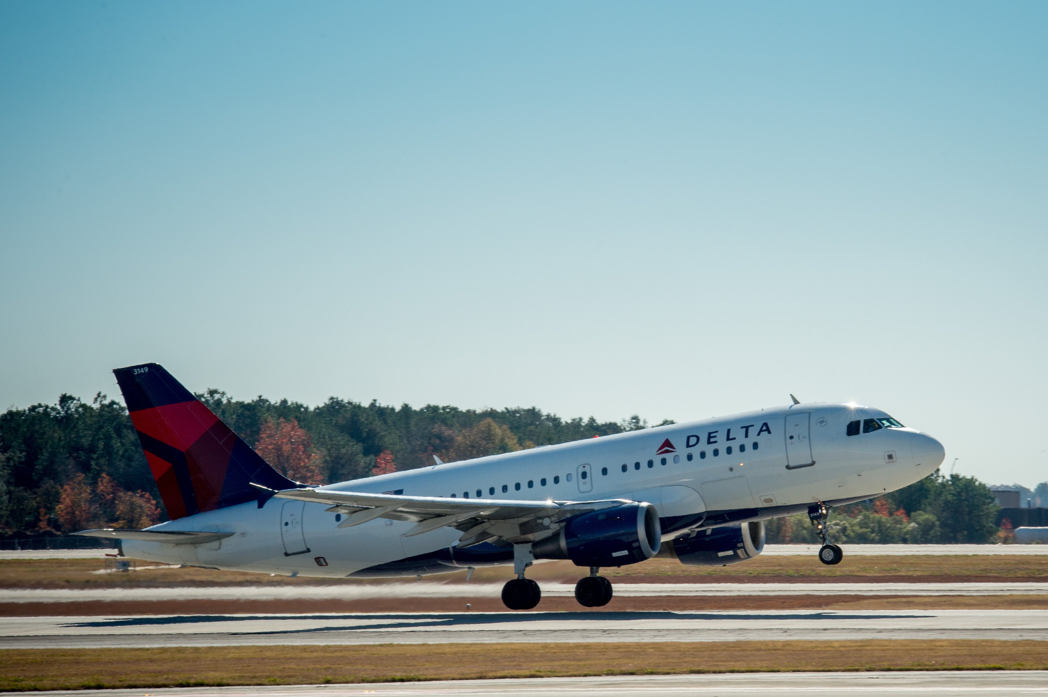 Delta aircraft taking off from runway