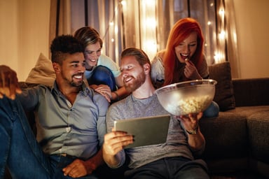 Friends watching entertainment on a tablet