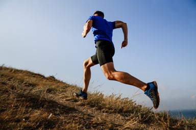 Man running up a hill
