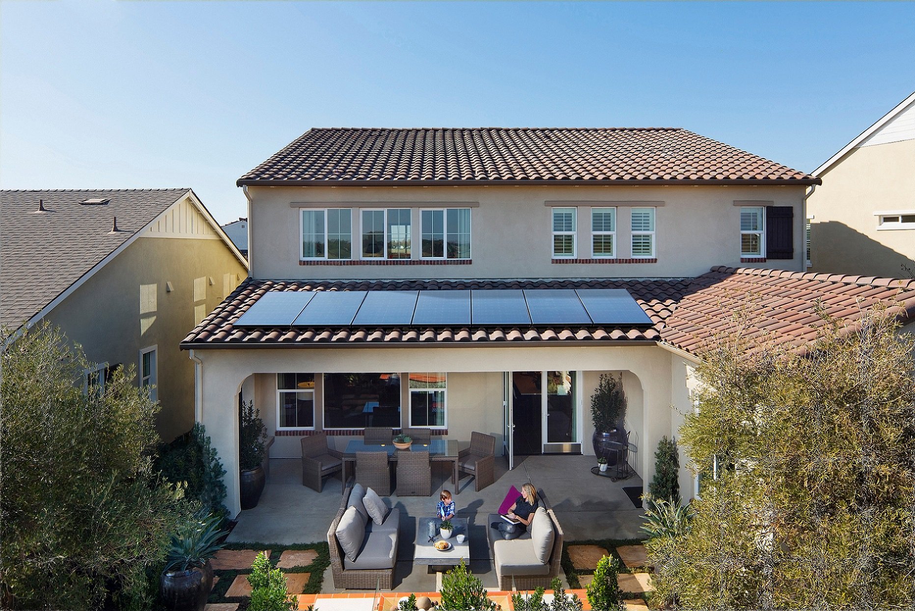 Home with rooftop solar panels. 