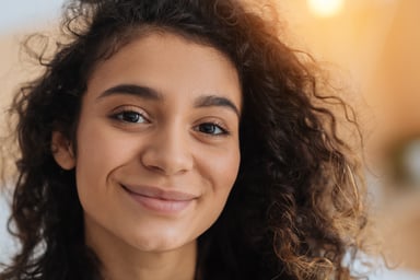 smiling young female adult_GettyImages-890606818