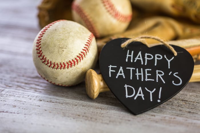 A sign in a heart says happy Father's Day