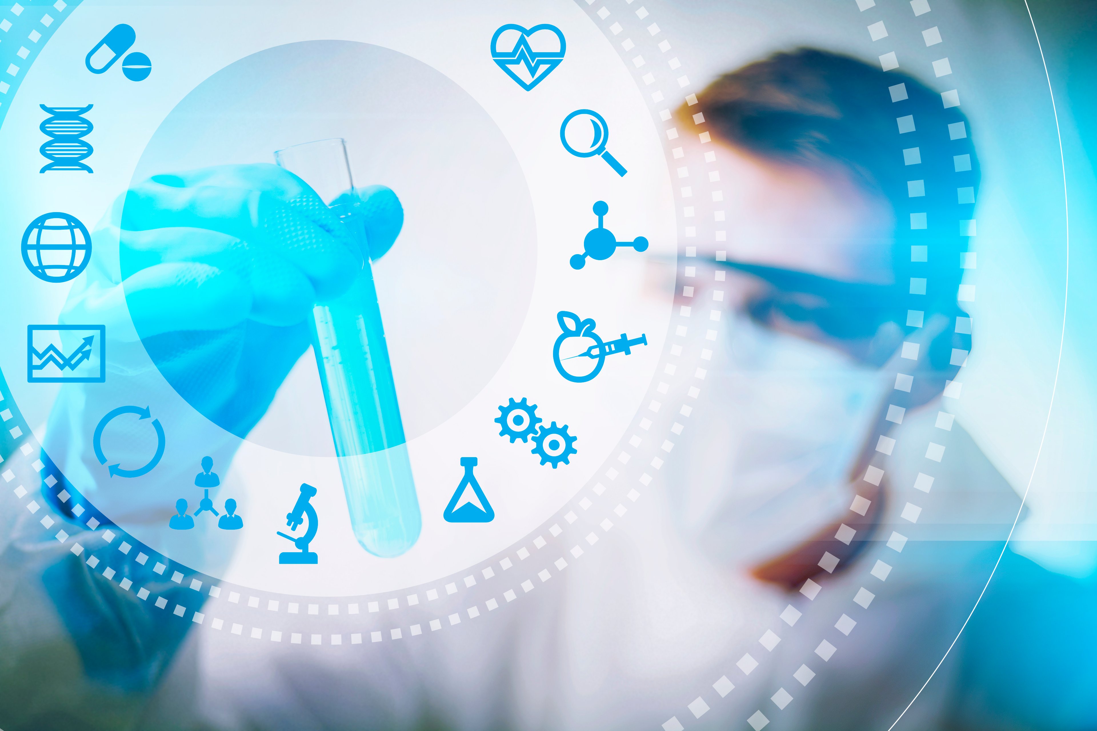Scientist holding test tube with icons related to drug research displayed in foreground