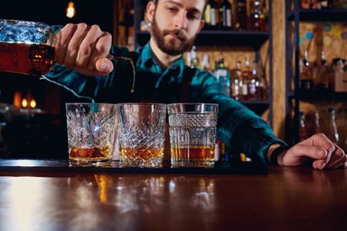 Pouring Spirits Into a Glass
