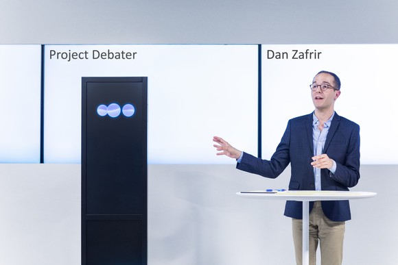 IBM's Project Debater and debate expert Dan Zafrir.