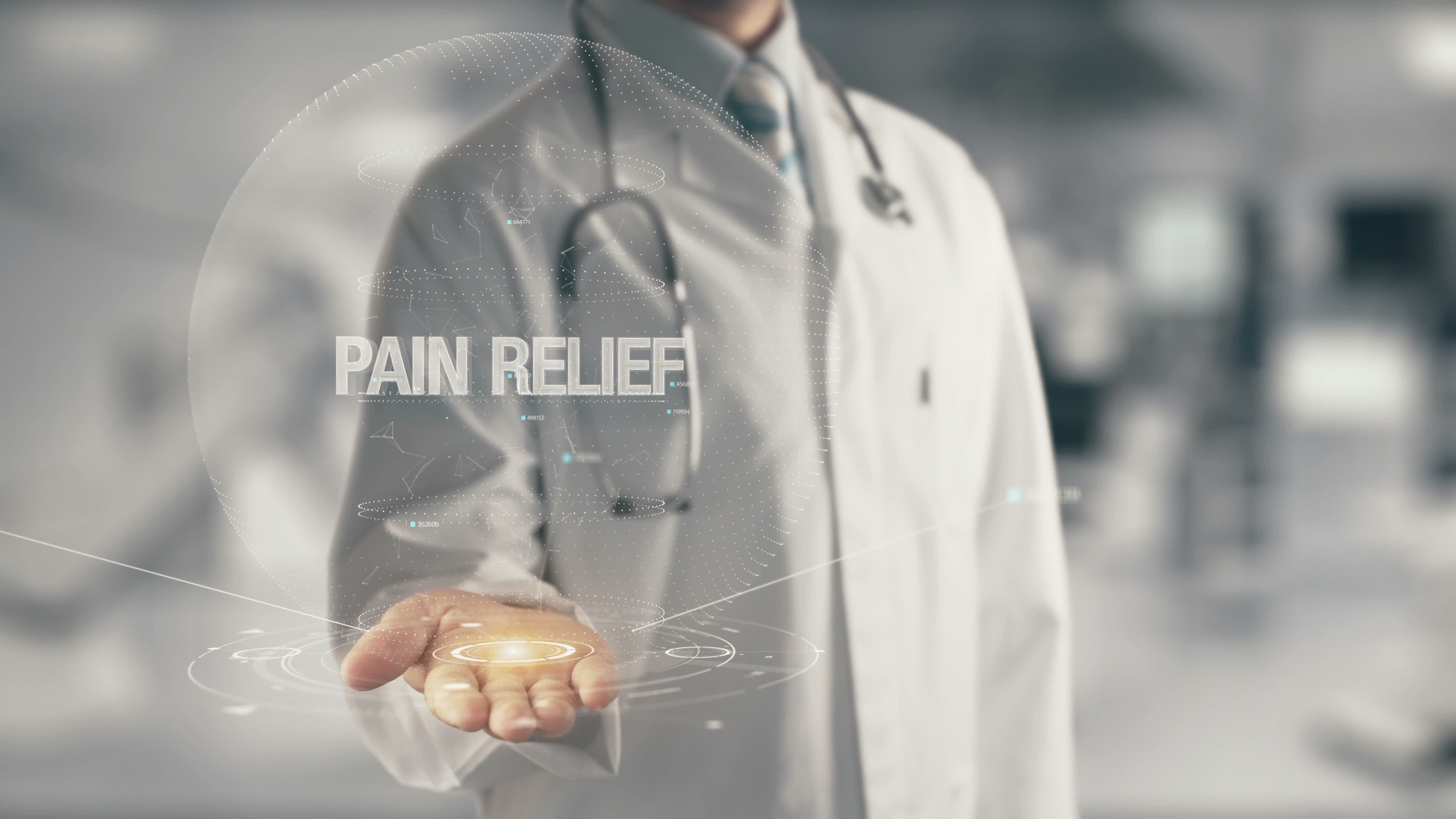 Doctor with his hand out and the words "pain relief" hovering about his open hand.