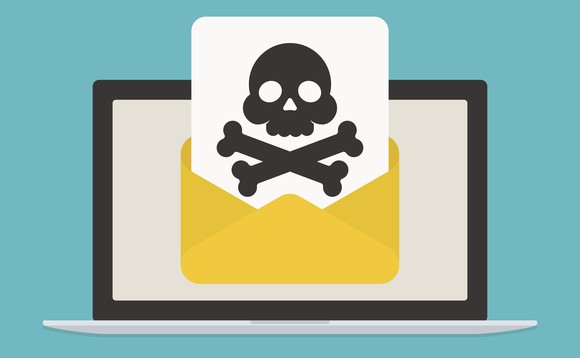 A laptop with an open envelope on the screen, with an image of a skull and crossbones emerging from it