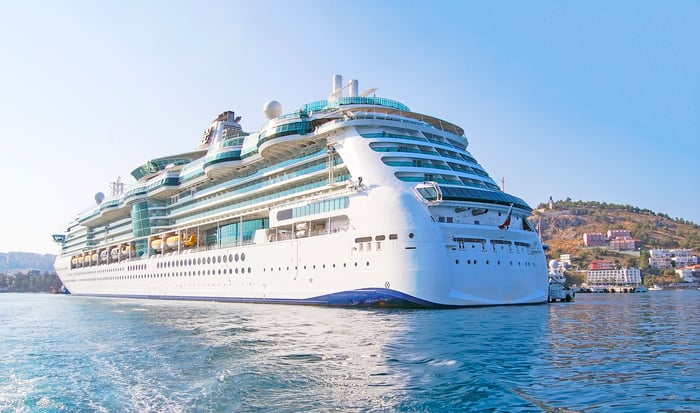 Cruise ship off an island. 