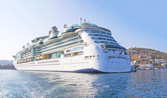 Cruise ship off an island. 