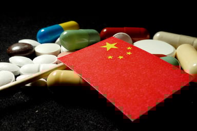 chinese-flag-on-medicine-pills-getty