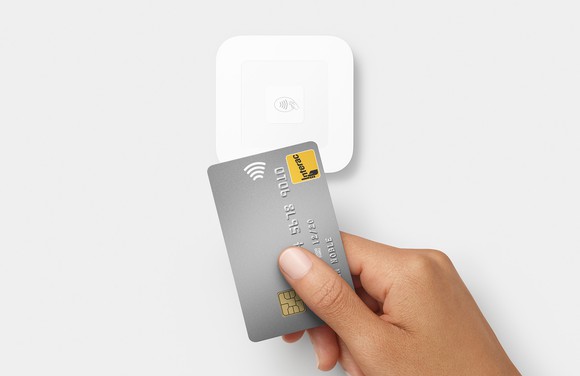 A square contactless chip reader.