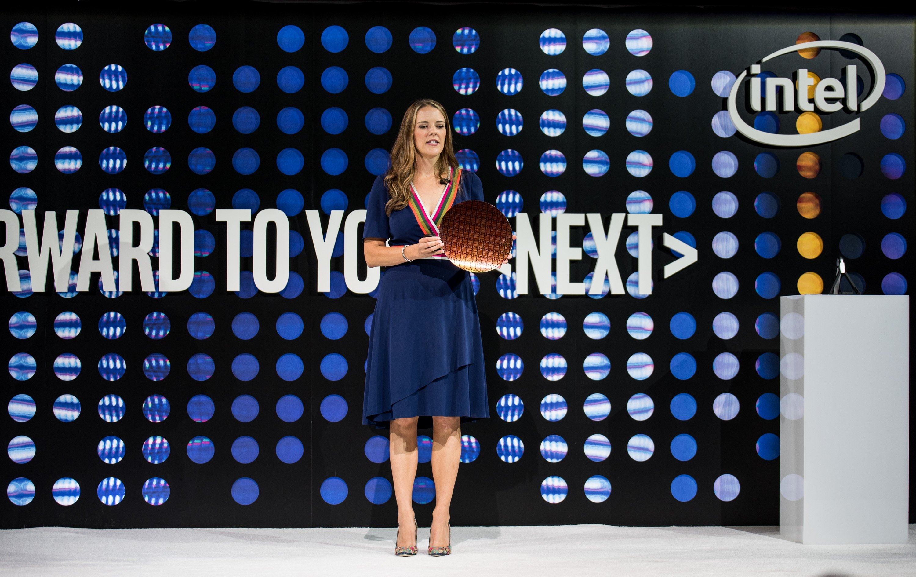 Intel Data Center Group marketing chief Lisa Spelman holding a wafer of Xeon processors.
