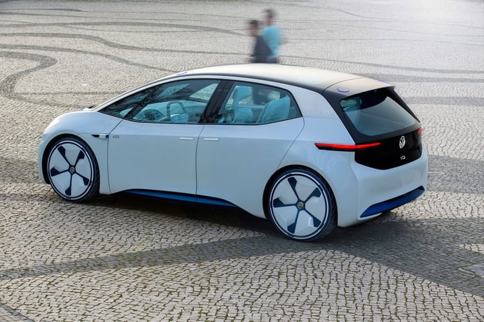 The Volkswagen I.D. concept vehicle, a sleek-looking white hatchback