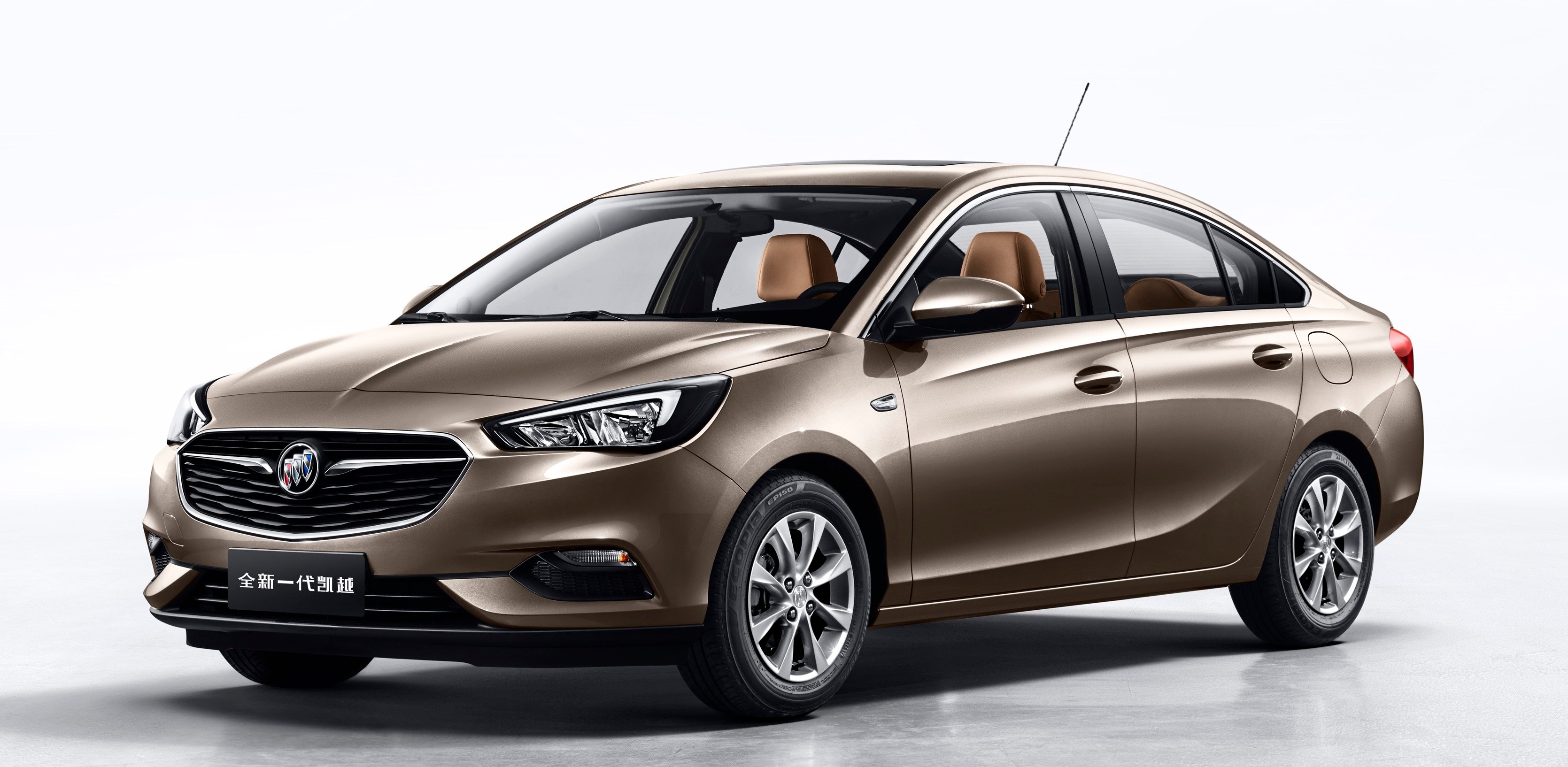 A brown Buick Excelle, a small four-door sedan