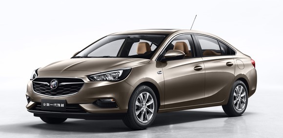 A brown Buick Excelle, a small four-door sedan