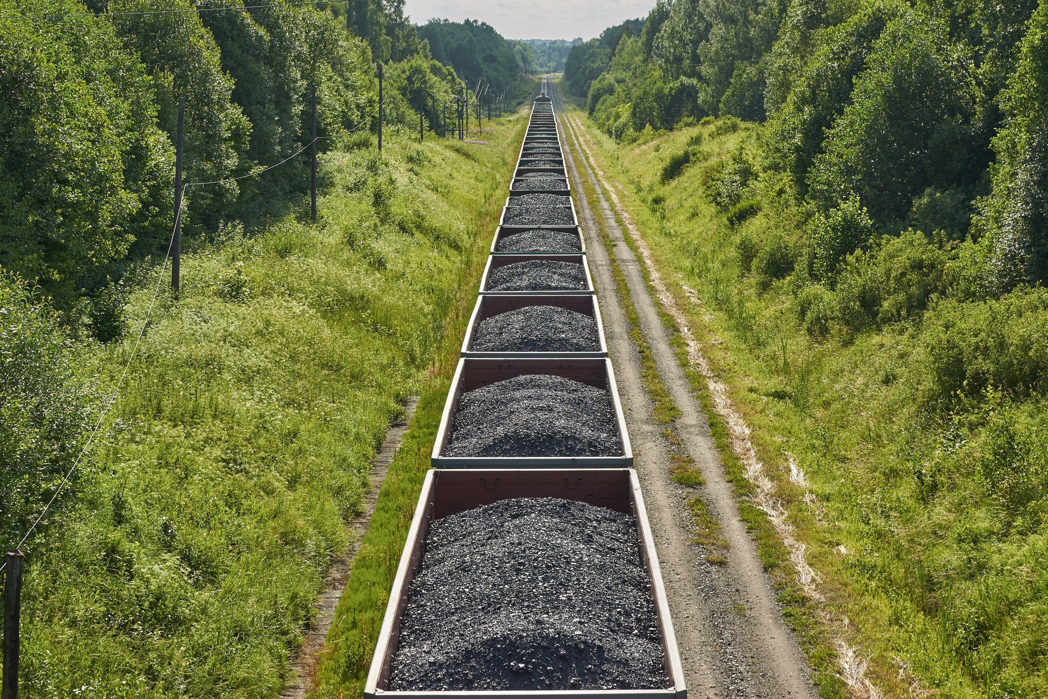 Railway cars carrying coal, seen from above
