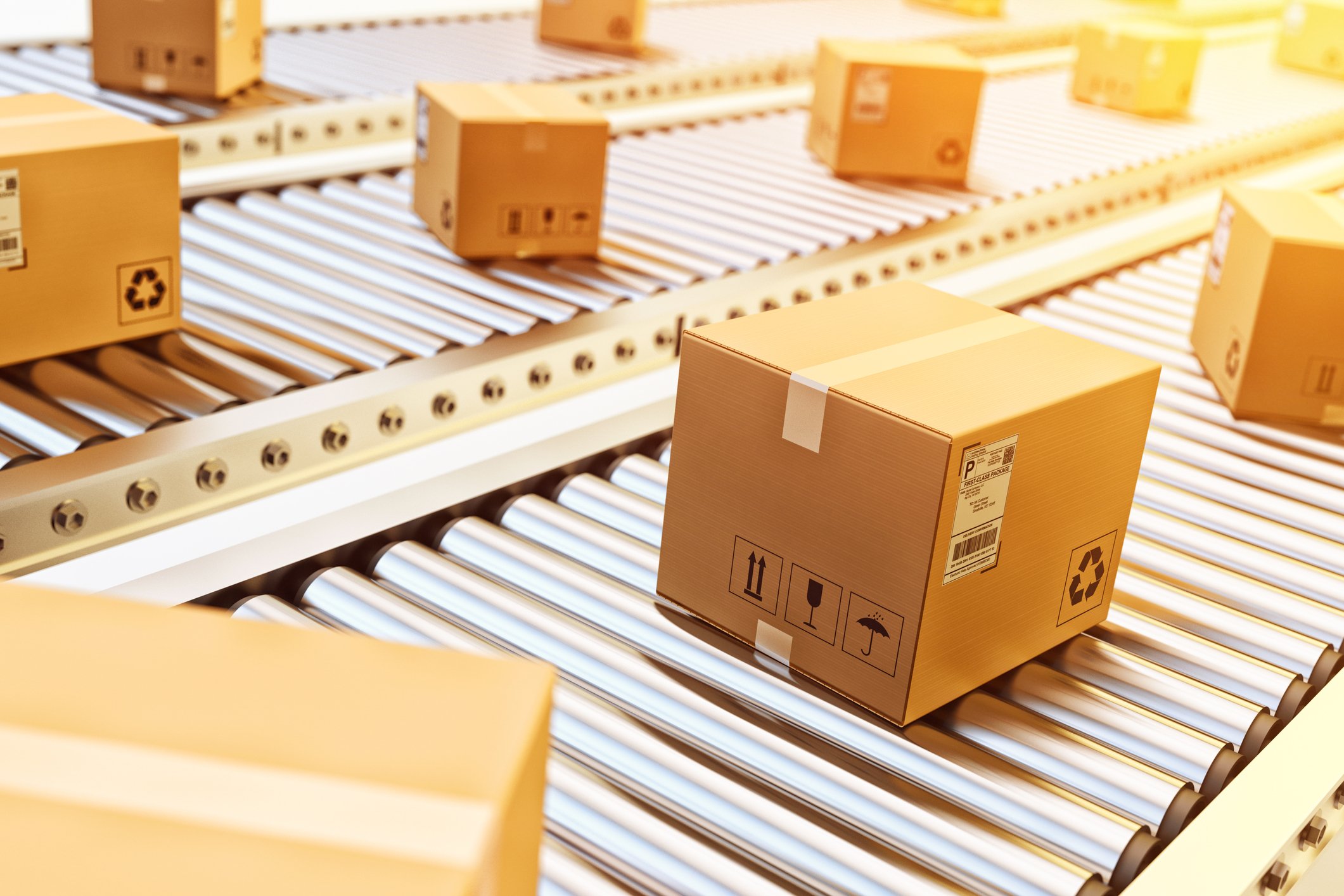 Sealed shipping cartons being sorted in a warehouse