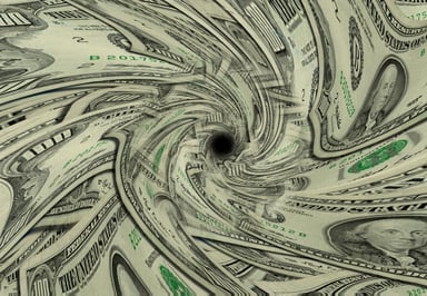 Money swirling away getty