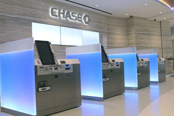 Lobby of a Chase banking branch with modern ATMs.
