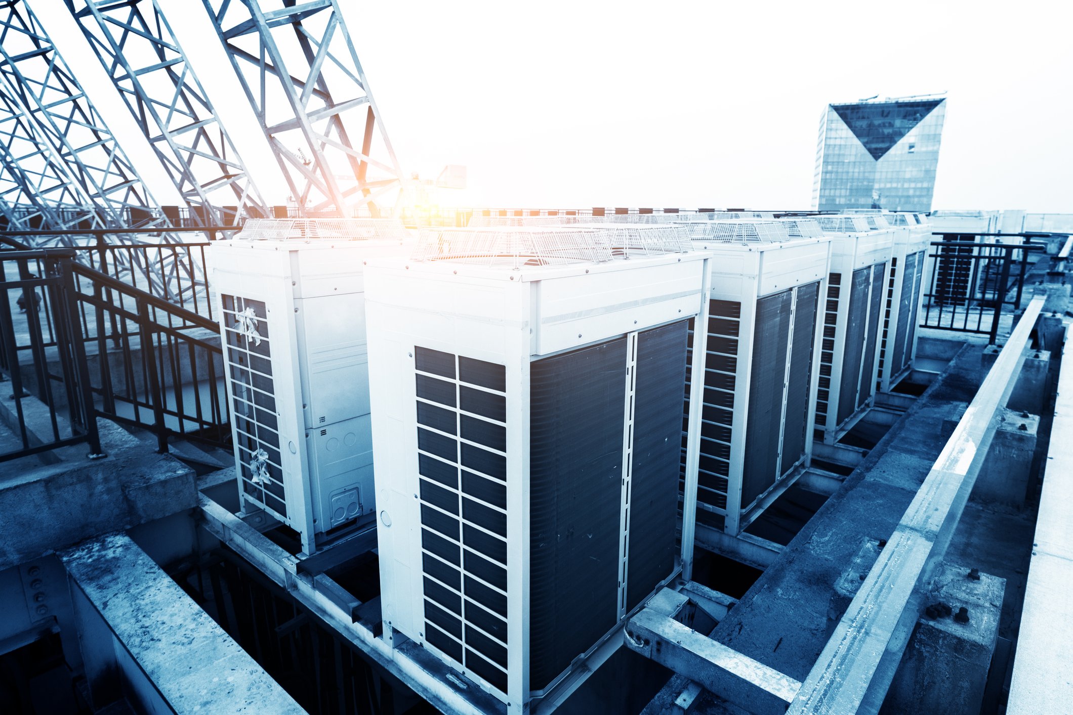 Air conditioning units on top of an industrial building.  