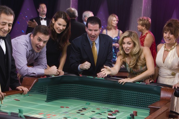 People betting in a casino