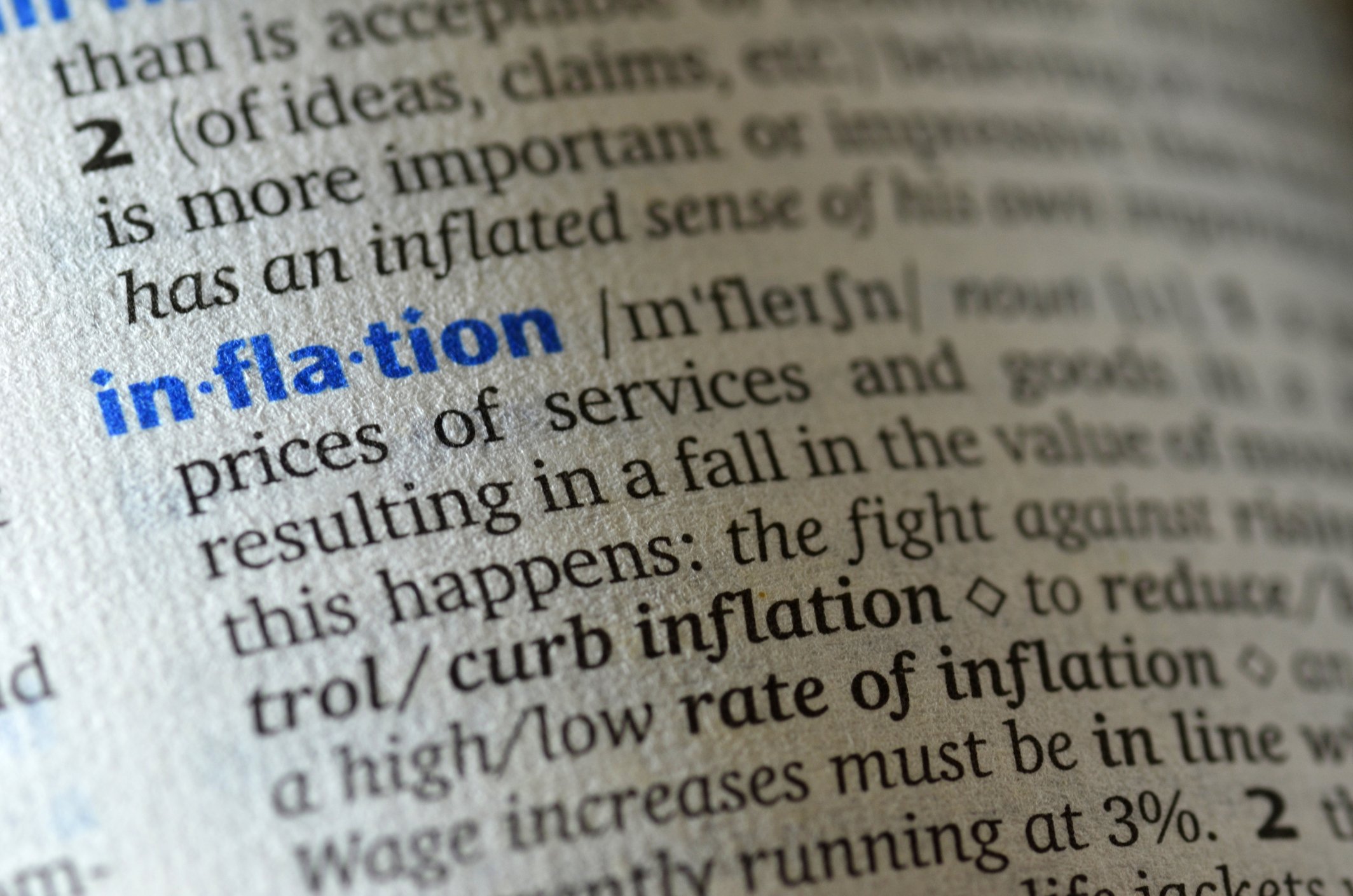 The word inflation being defined in a dictionary.