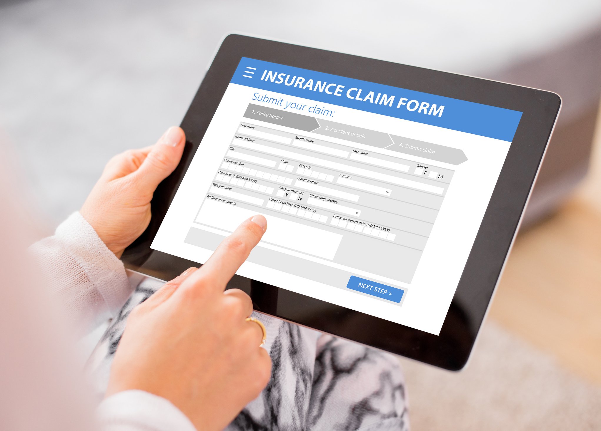 Insurance claim form on tablet