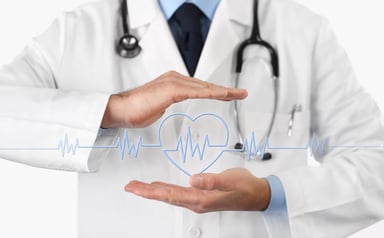 Doctor with hands over heartbeat