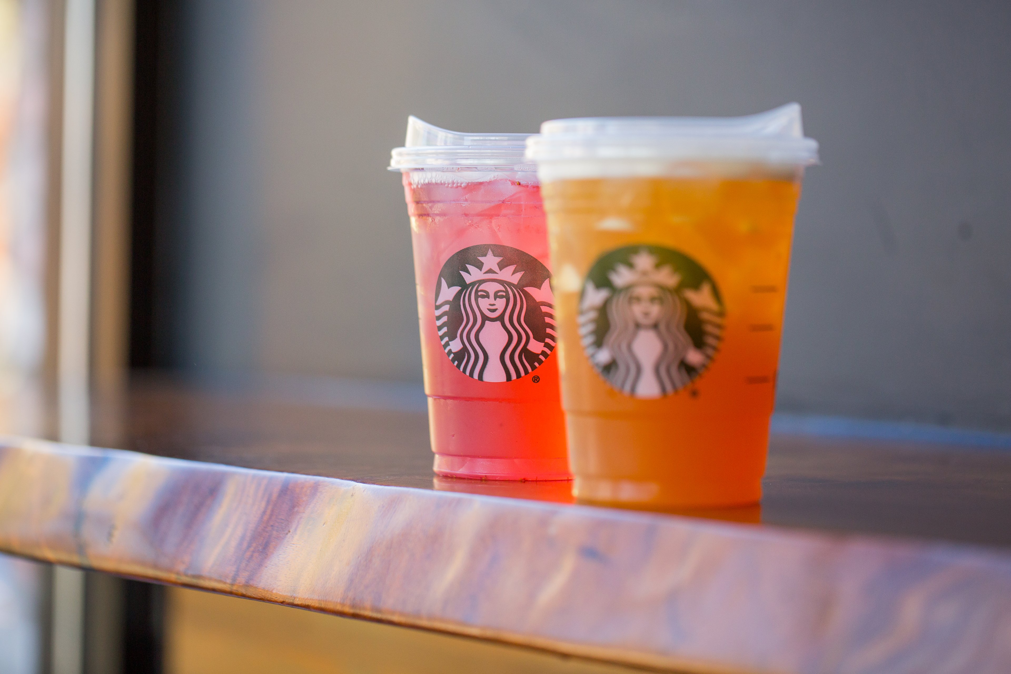 Starbucks iced beverages on a countertop.