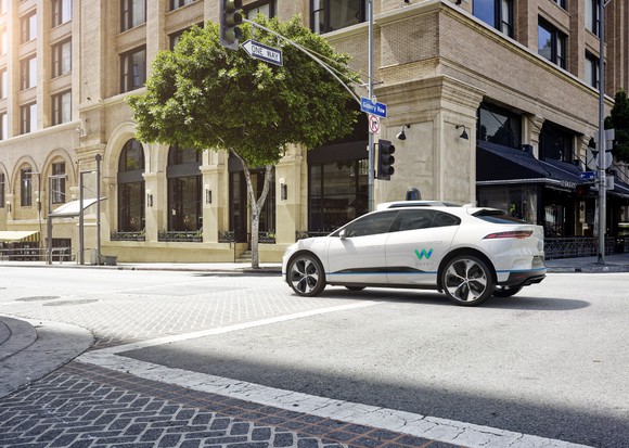 Waymo Jaguar iPace crossing intersection