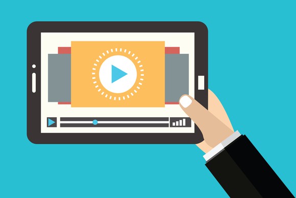 An illustration of a person holding a tablet, watching a video.