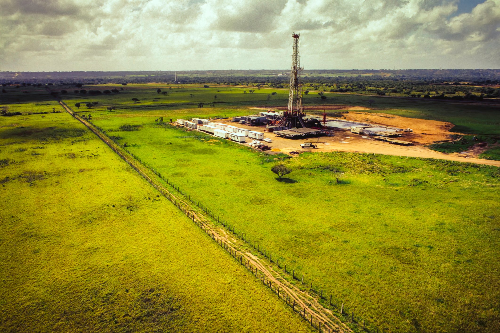 Drilling rig in a field.