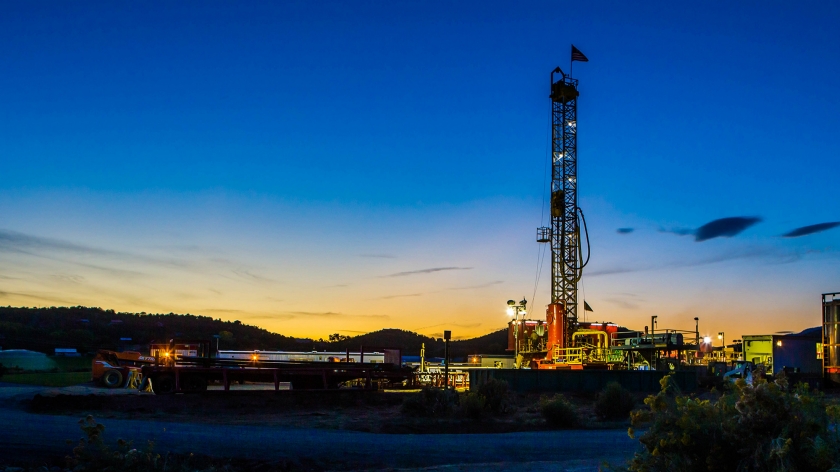 Drilling rig at night.