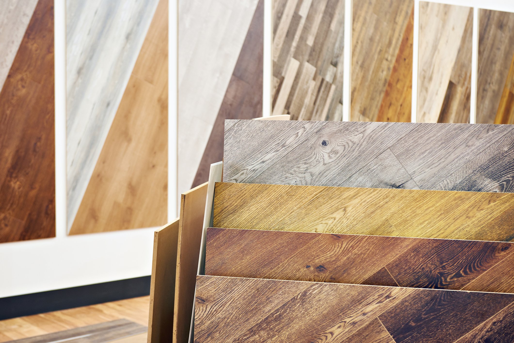 Inventory of different colored hardwood flooring. 