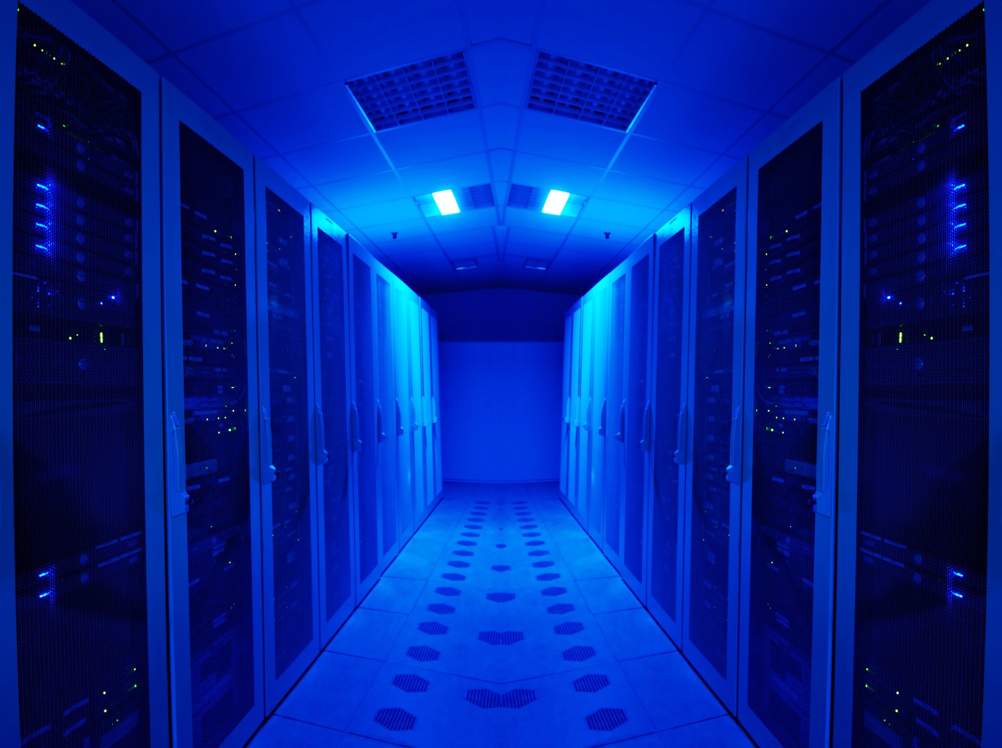 Banks of servers bathed in blue light