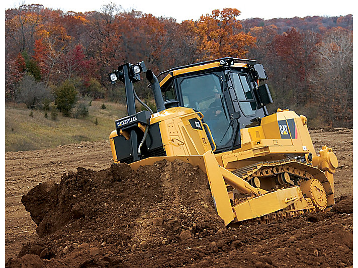 Bulldozer plowing dirt