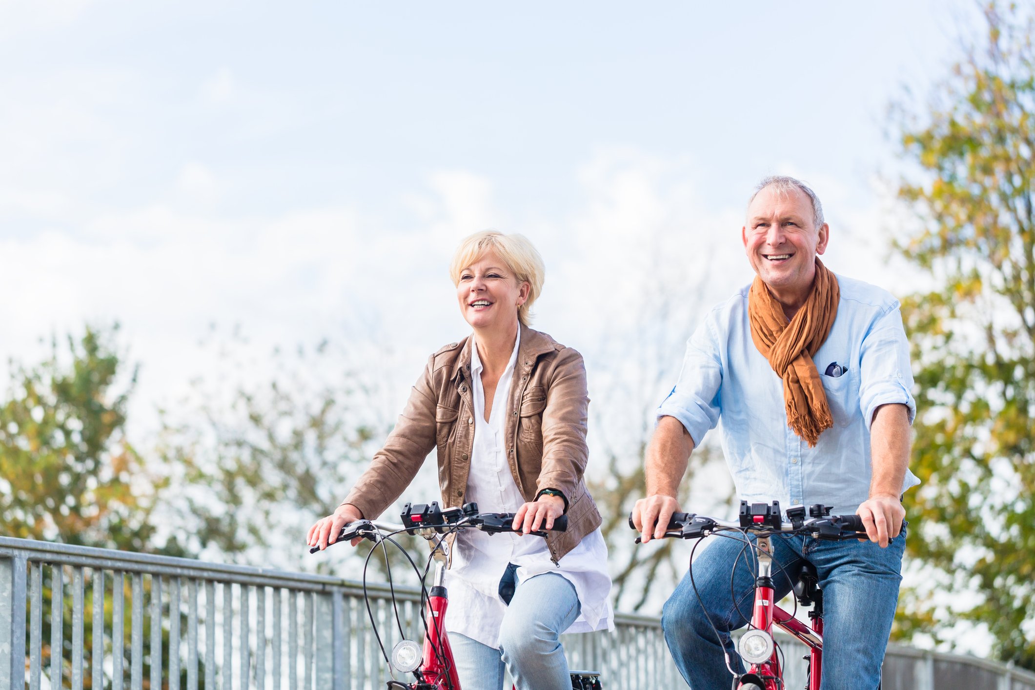 Older couple riding bikes