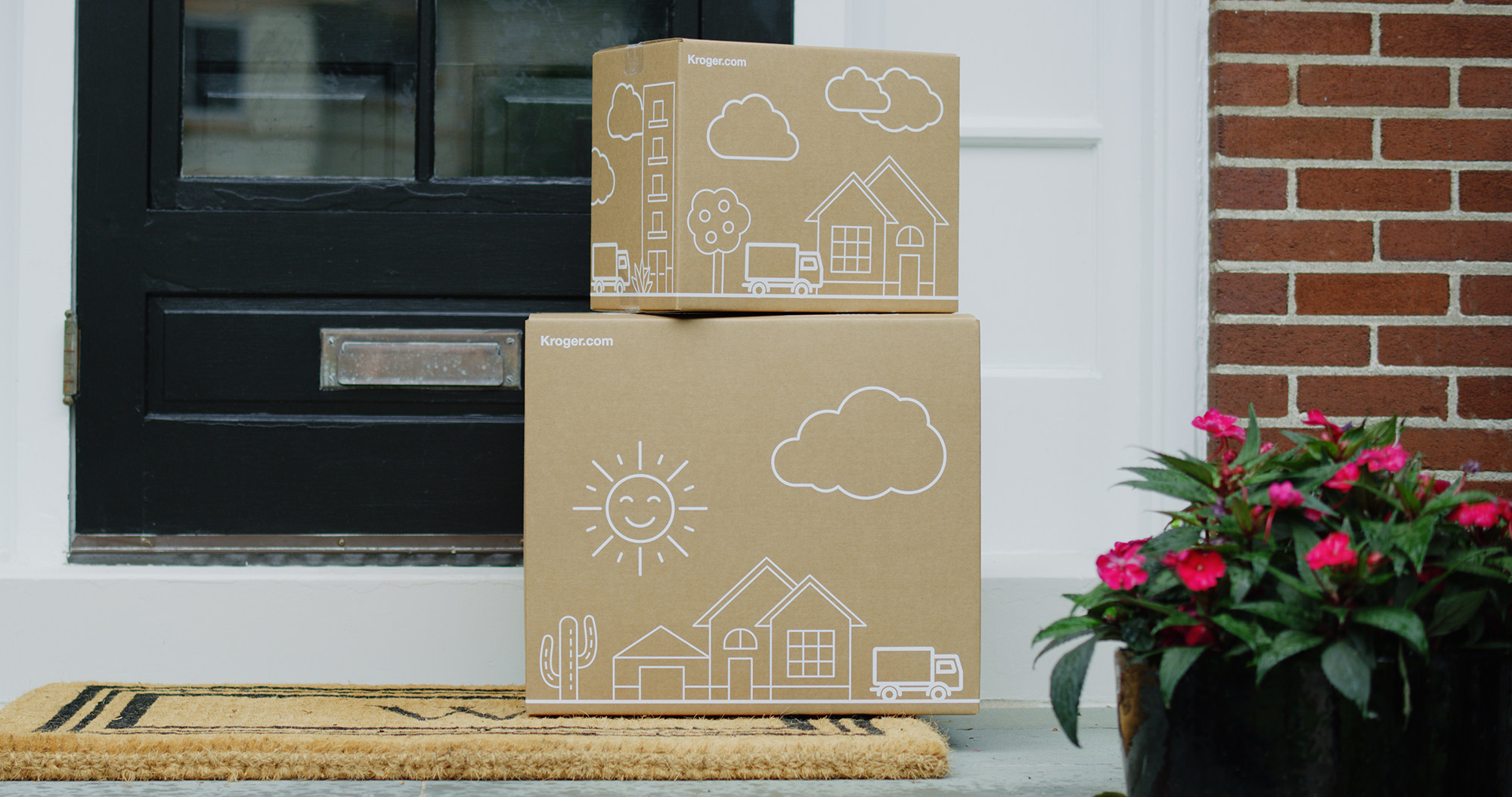 Kroger boxes sitting outside a home's front door