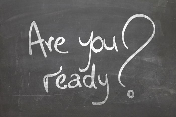 A blackboard says are you ready?