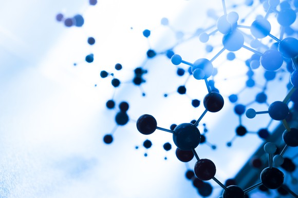 Depiction of molecules on a blue background.