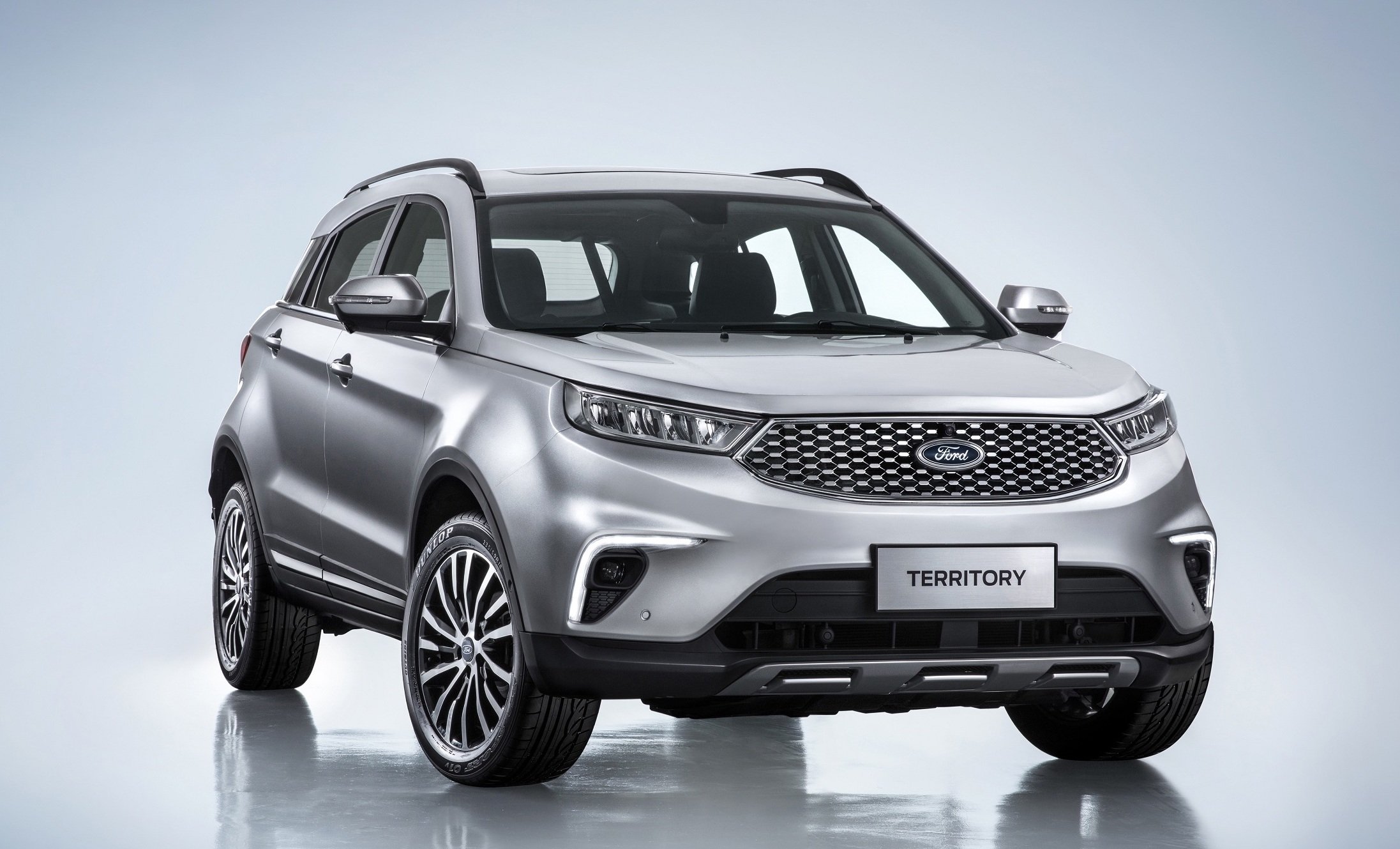 A silver Ford Territory, a midsize SUV, shown from the front.