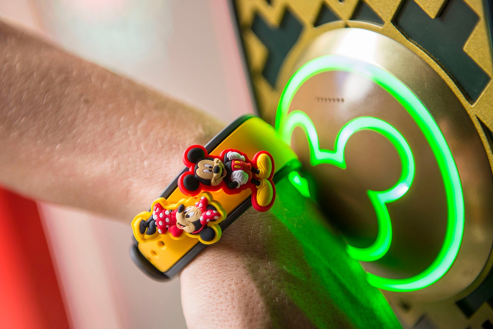 A Disneyland visitor uses a MagicBand.