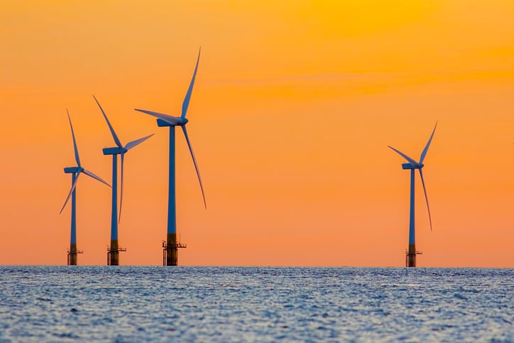 Offshore wind turbines at dawn.
