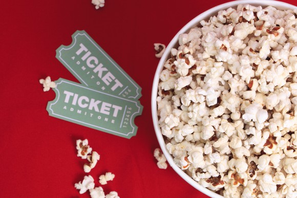 Movie tickets and popcorn